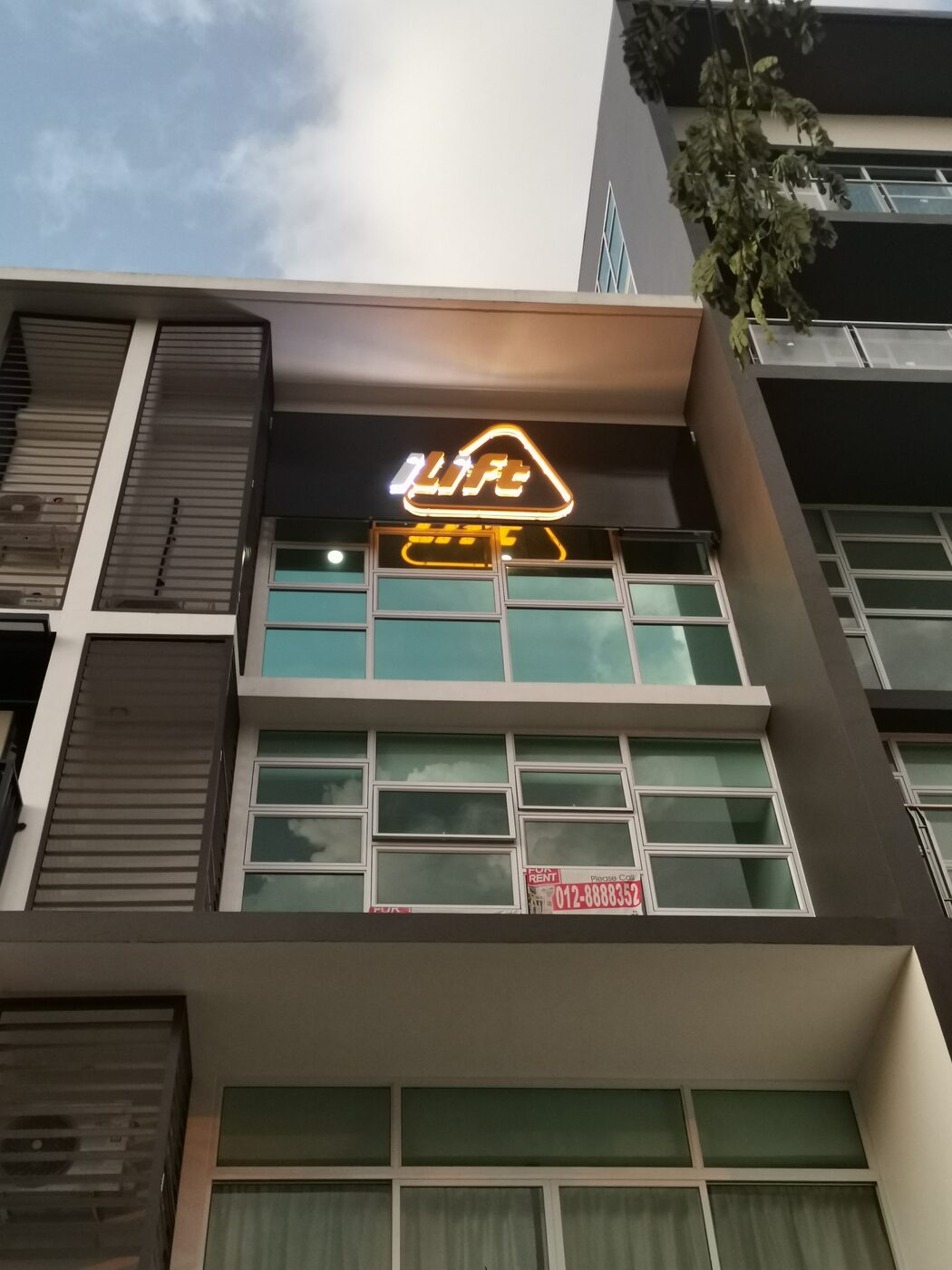 iLift Gala City studio exterior with neon sign, Kuching